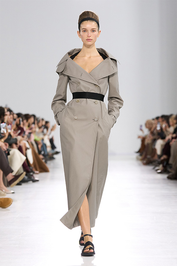 Max Mara Spring/Summer 2026 Fashion Show - Light grey trench look and black waist belt.
